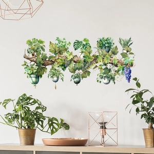 Detail showing tropical hanging plant wall decals with monstera and ivy on a tree branch