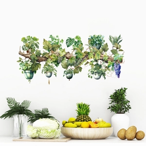 Detail of self-adhesive wall sticker featuring watercolor hanging plants on wood
