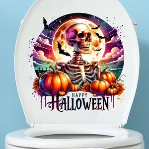 Detail view of self-adhesive Halloween toilet sticker with skull, pumpkin and bat motifs