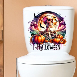 Detail of Halloween toilet sticker featuring skull, pumpkins and Happy Halloween text