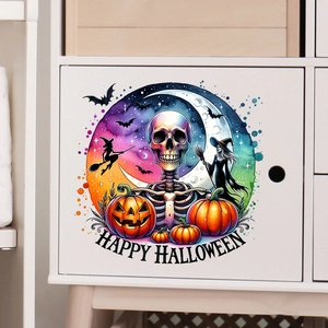 Close-up of colorful Halloween decals with pumpkin and skull on white modern furniture