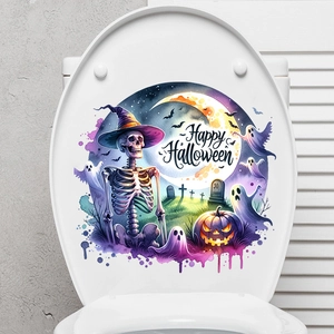 Halloween toilet sticker showing a skull with purple hat, ghost, and pumpkin on white lid