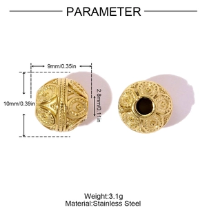 Macro detail of gold stainless steel hollow bead with ornate floral texture and dimensions