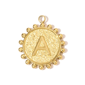 Detail of gold letter A pendant with hammered texture and beaded edge on stainless steel