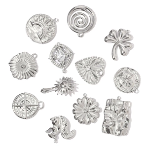 DIY stainless steel pendants featuring clover, sunburst, and star designs for necklaces