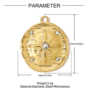 Detail view of a gold stainless steel star compass pendant with rhinestone dimensions and weight