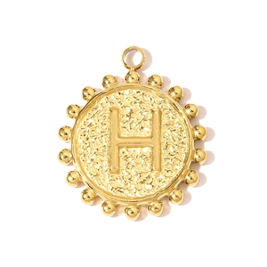 Detailed view of a gold-plated stainless steel round pendant with letter H and hammered texture