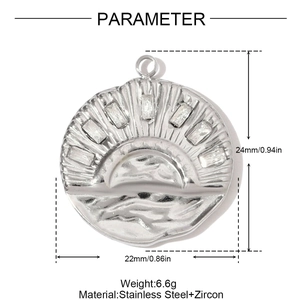 Macro detail of a round stainless steel sunrise pendant with inlaid rectangular zircons