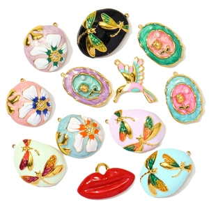 Enamel flower dragonfly hummingbird and rose pendants in gold plated stainless steel