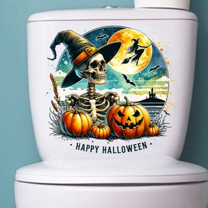 Halloween toilet sticker featuring pumpkins and skulls applied on white ceramic