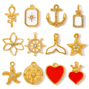 Set of 12 gold plated stainless steel pendants including heart, anchor and starfish