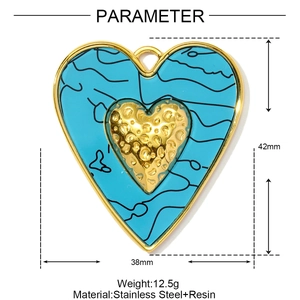 Blue resin heart pendant with gold detailing and stainless steel edges 42x38mm