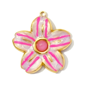 Detailed macro of a light purple cherry blossom pendant with gold metal edges