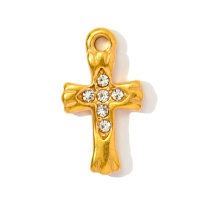 Macro detail of gold-plated stainless steel cross pendant featuring six sparkling crystals