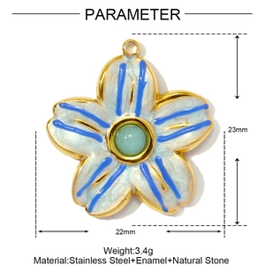 Detailed view of a 23mm blue enamel flower pendant with natural green stone in gold steel