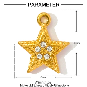 Macro shot of gold star pendant with rhinestones and size dimensions 15mm by 13mm