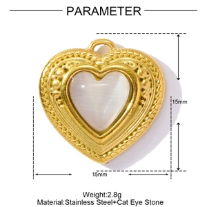 Close-up of 15mm gold stainless steel heart pendant with white cat eye stone inlay