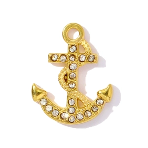 Detailed view of a gold-plated anchor pendant with sparkling crystals and nautical design