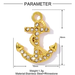 Golden stainless steel anchor pendant detailed with clear rhinestones and dimensions