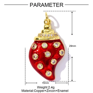 Detail of red strawberry charm with sparkling white zircons and dimensions of 29x15mm