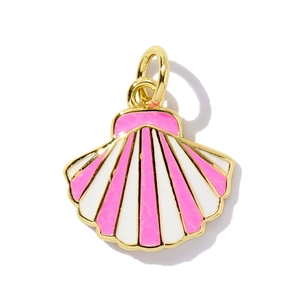 Detail of pink and white enamel shell charm with polished gold finish edge and loop
