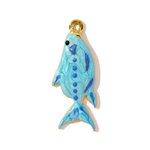 Detailed view of fish-shaped ocean pendant with blue enamel and sparkling glitter finish