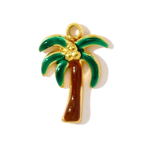 Detail of gold-plated coconut palm tree pendant with green and brown enamel inlay