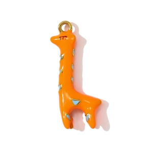 Detailed view of orange enamel giraffe pendant with blue hearts and gold metal ring