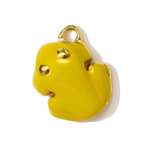 Detail of yellow enamel cartoon dog charm with shiny golden metal loop for DIY jewelry