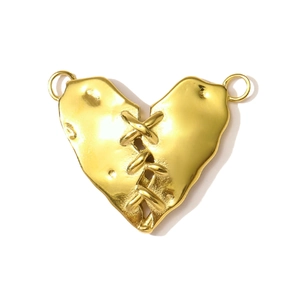 Vintage gold stitched heart pendant with hand-forged texture and dual hanging loops
