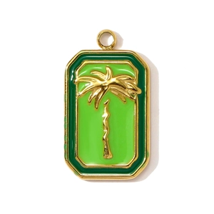Detail of a rectangular gold-plated palm tree pendant with green enamel finish