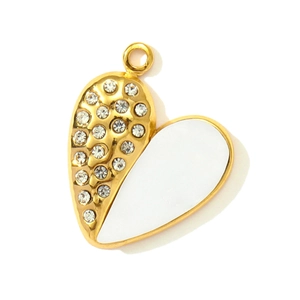 Macro detail of gold-plated heart pendant with zircon inlay and white enamel finish