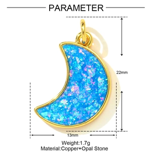 Detailed view of crescent moon pendant with blue opal and gold copper frame, 22mm height