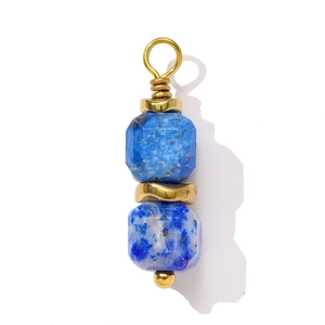 Detail of handmade gold wire-wrapped pendant featuring double blue lapis lazuli stones