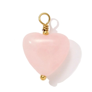 Close-up of pink quartz heart pendant with gold wire wrap and bead detail