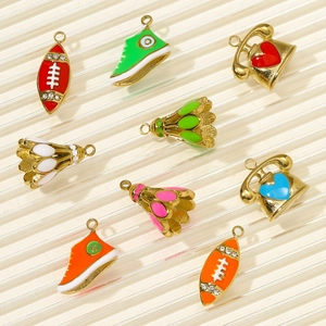 Detailed close-up of DIY colorful enamel sports charms including footballs and sneakers