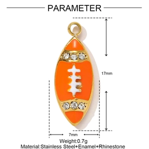 Detail of orange enamel rugby pendant with rhinestones and stainless steel frame