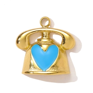 Detailed view of a gold-plated vintage telephone pendant with a blue heart enamel inlay