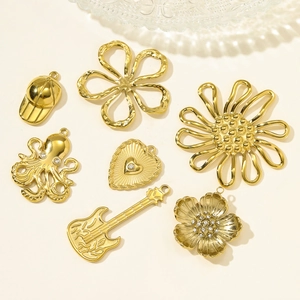 Assorted gold stainless steel pendants featuring heart, flower, and octopus designs