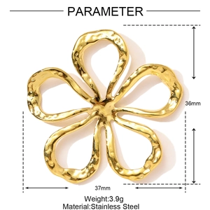 Macro shot of 36mm gold stainless steel 5-petal flower pendant with textured surface