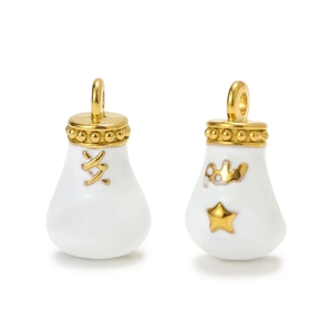 Detailed macro of white enamel bag pendants with golden character and crown design
