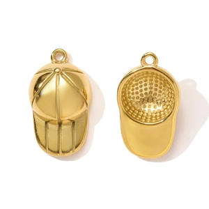 Macro view of gold-plated stainless steel baseball cap charms showing texture and clasp