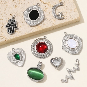 Polished stainless steel pendants with natural stones in Hamsa and heart shapes