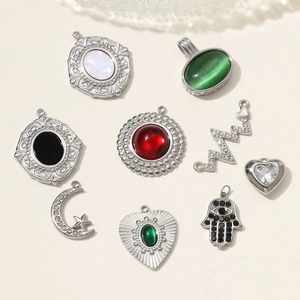 Polished stainless steel celestial charms with Hamsa and heart motifs for jewelry making