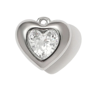 Close-up of heart-shaped stainless steel pendant with clear faceted crystal stone