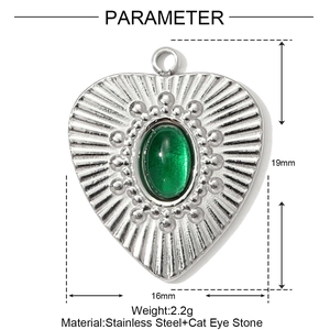 Polished stainless steel heart pendant with green cat eye stone and sunburst engraving