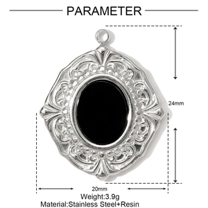 Detail of silver vintage embossed pendant with black oval resin and dimensions