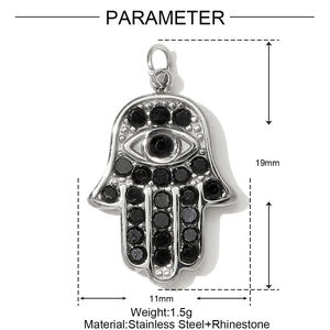 Macro view of Hamsa Hand stainless steel pendant with black rhinestones, size 11x19mm