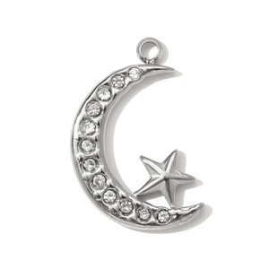 Detailed view of silver stainless steel crescent moon and star pendant with cubic zirconia