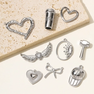 Mirror polished stainless steel DIY charms set featuring heart and coffee cup motifs
